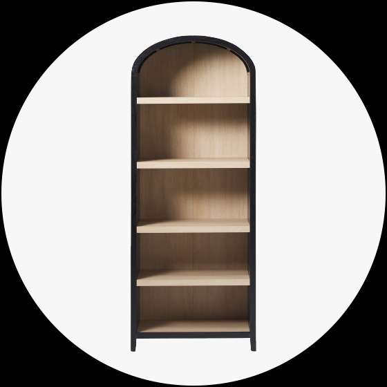 Black and wood bookshelf with arched top.
