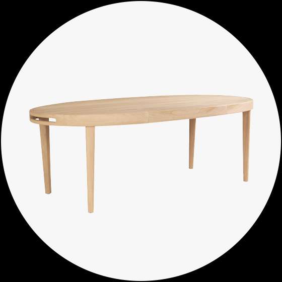 Oval wooden dining table.
