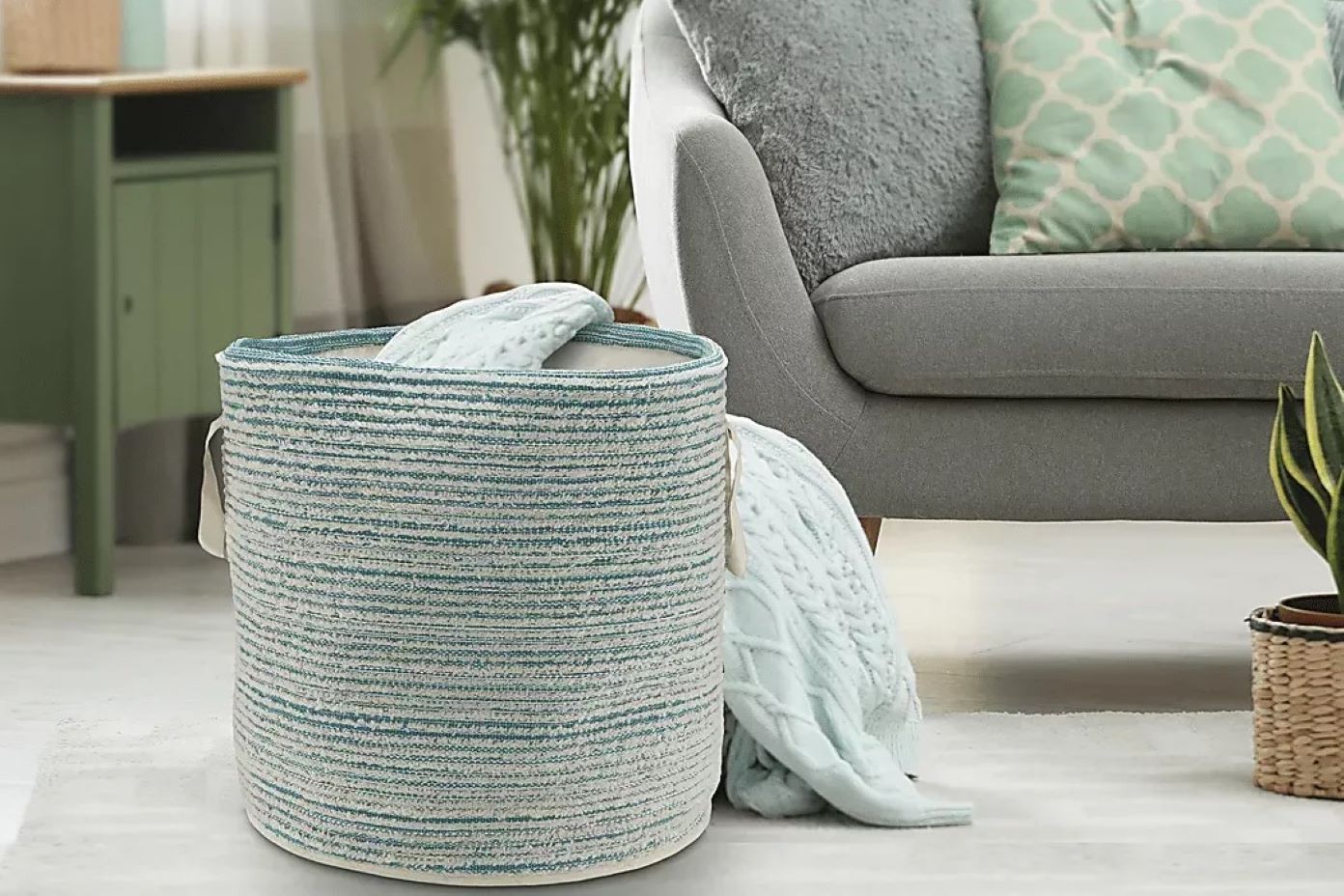 blue basket and gray couch