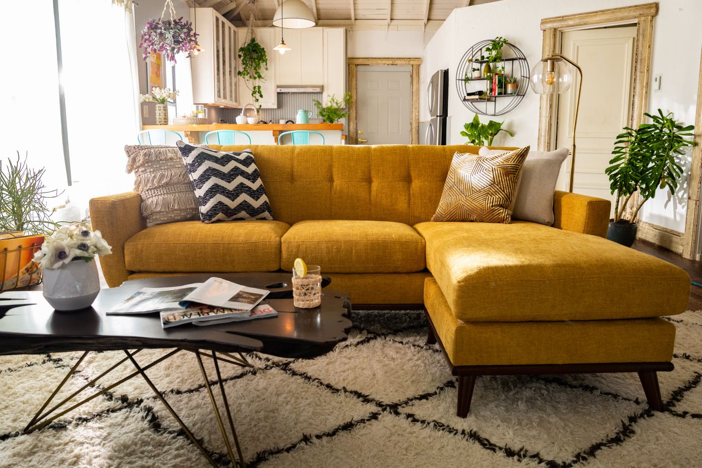 sunflower yellow chaise lounge in an earthy style living room 