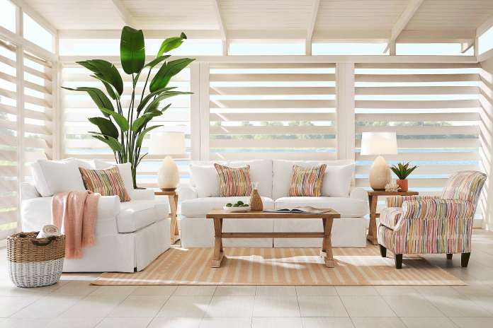 Beachy living room set in white, cream, brown, and other earth tones