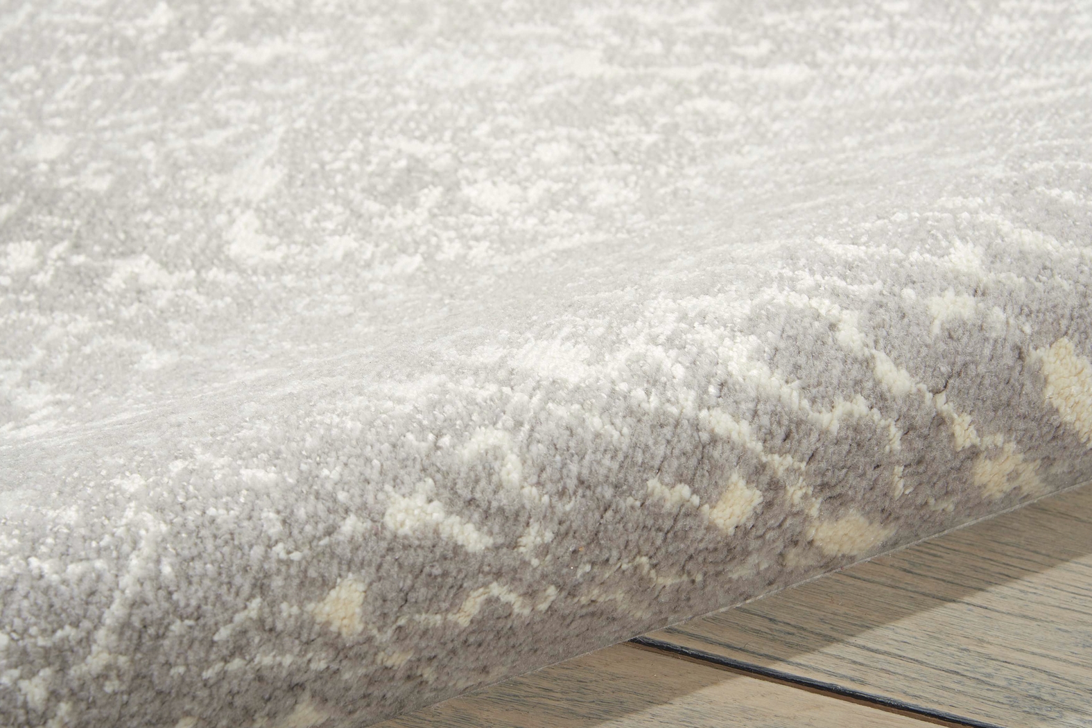 Carbonite Ivory 5'5 x 8' Rug - Thumbnail - Image 2