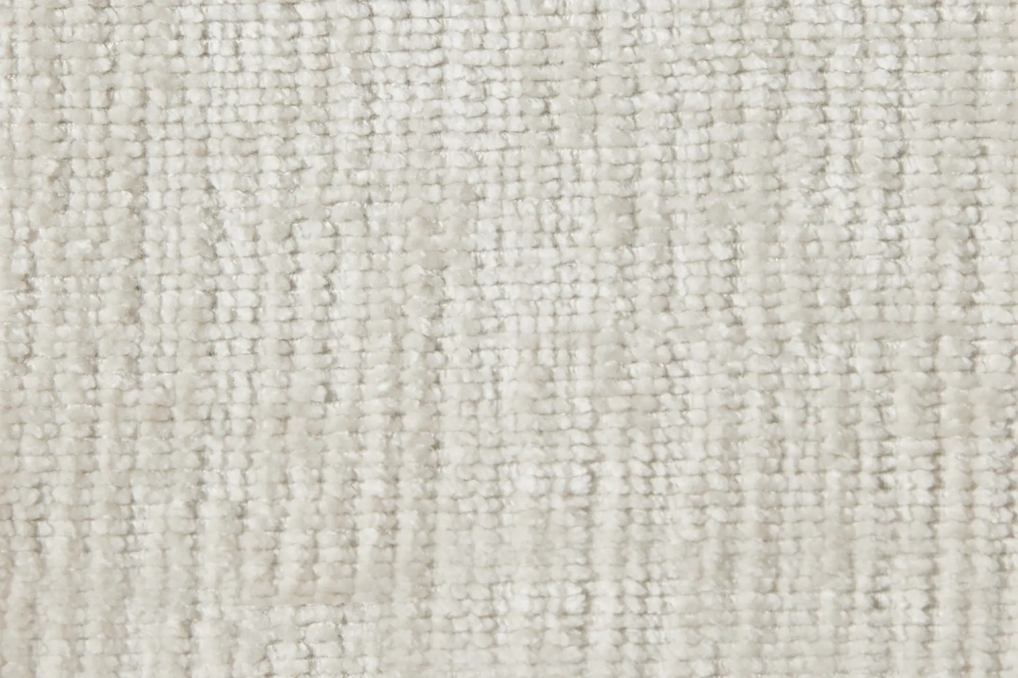 Close-up of a textured, off-white woven fabric with a soft, plush appearance.
