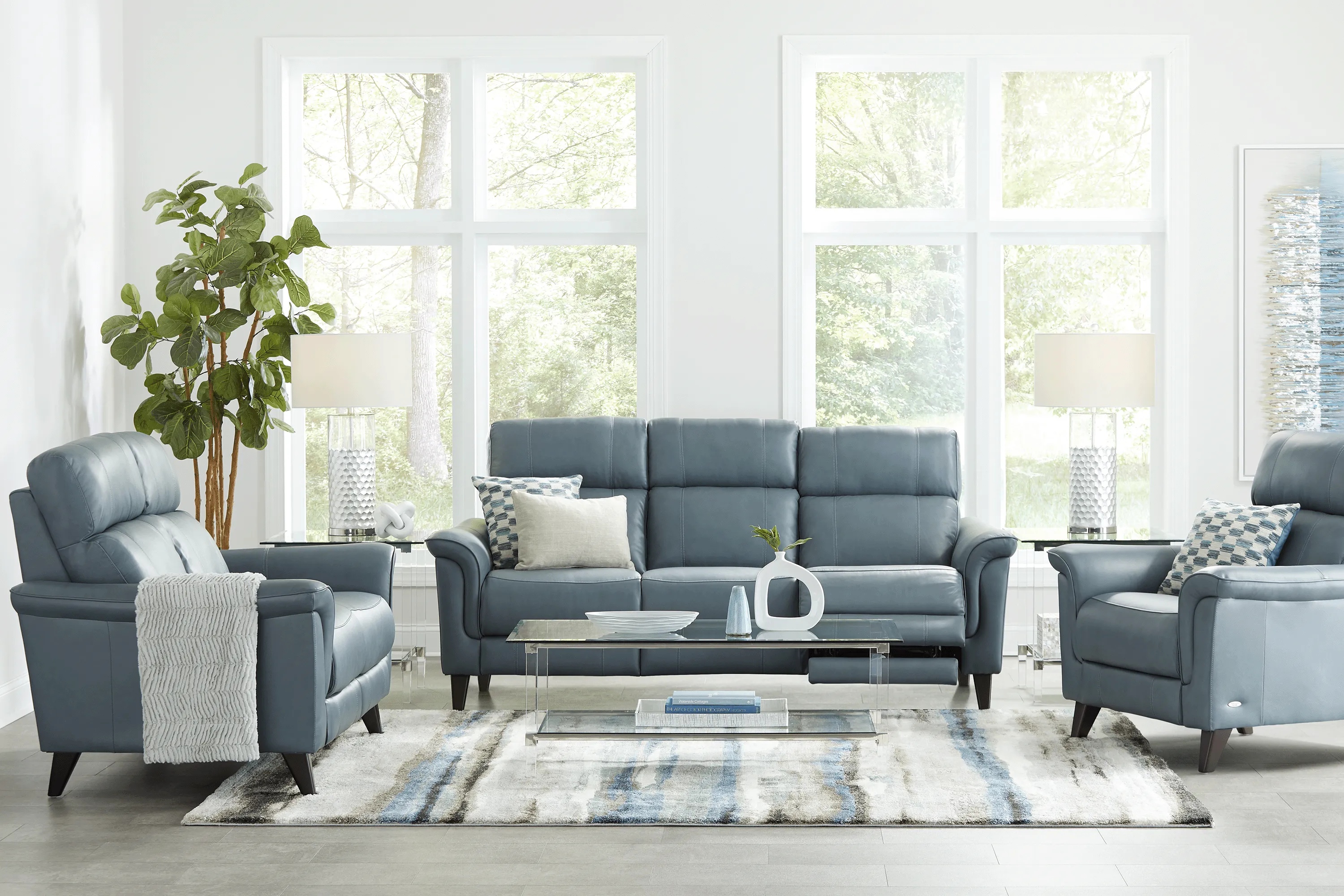 Cindy Crawford Home Avezzano Blue 8 Pc Leather Living Room with Dual Power Reclining Sofa - Thumbnail - Image 1