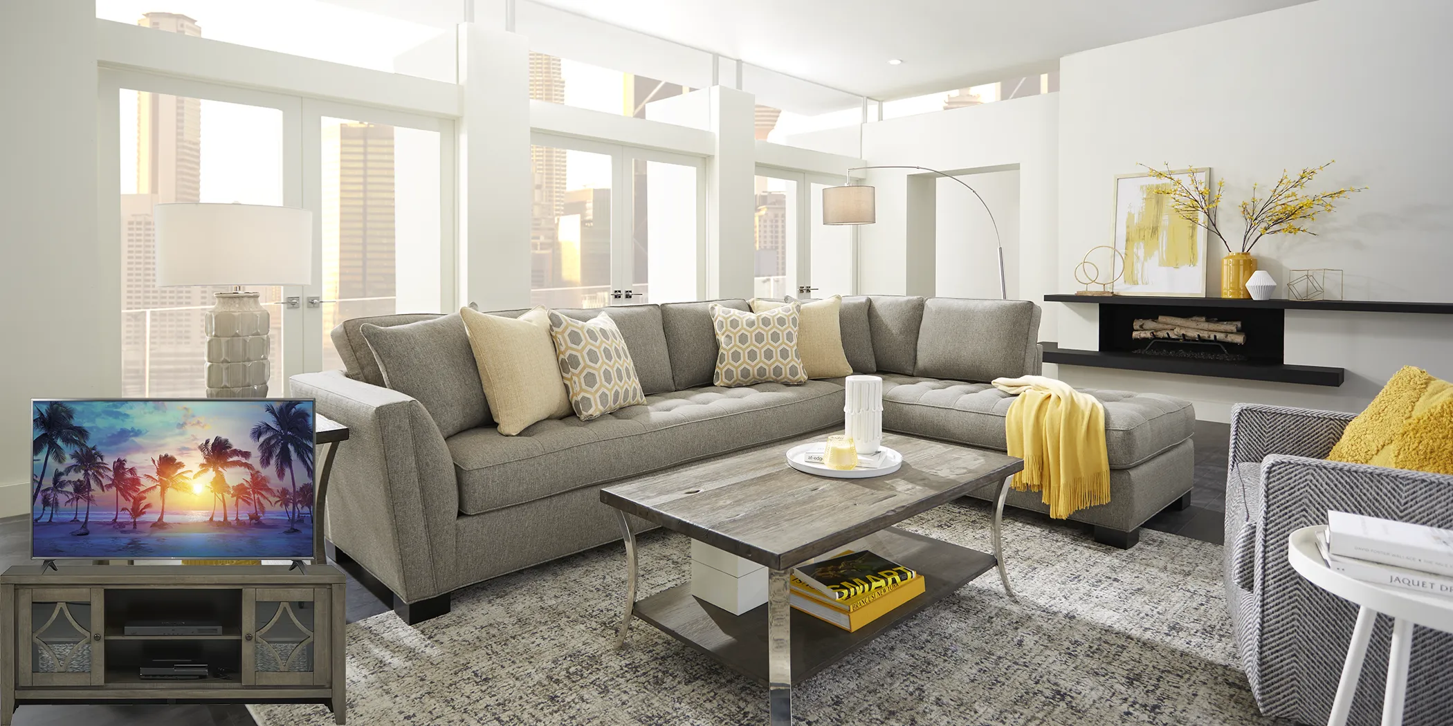 Cindy Crawford Home Calvin Heights Cobblestone 6 Pc XL Sectional Living Room Plus 70 in. TV - Thumbnail - Image 1