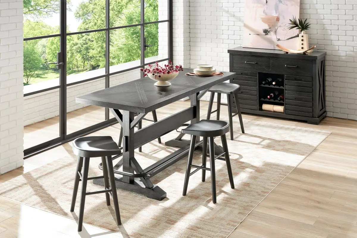 black dining table with matching stools and sideboard