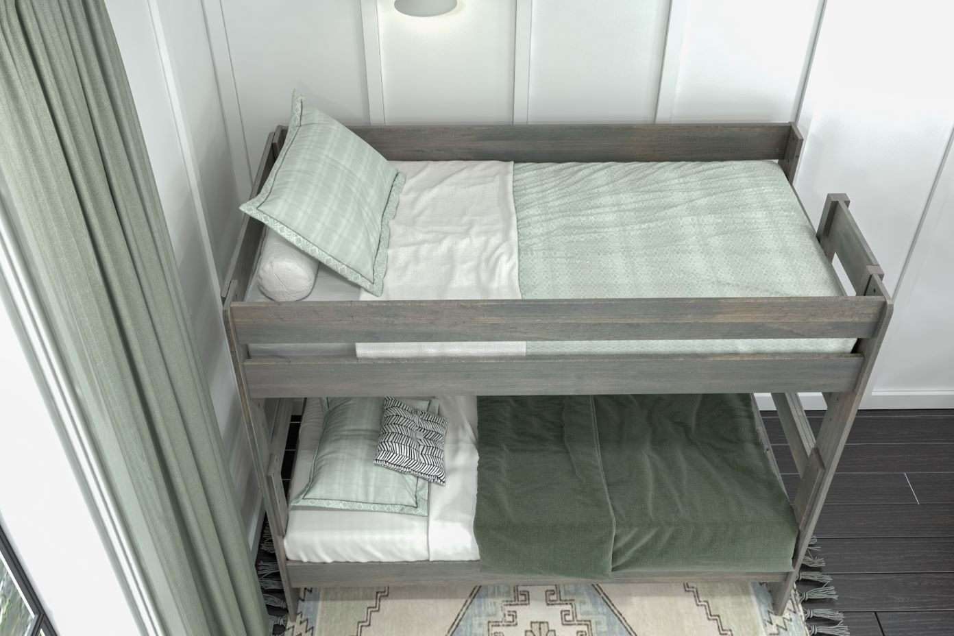 A bunk bed with green bedding and pillows.
