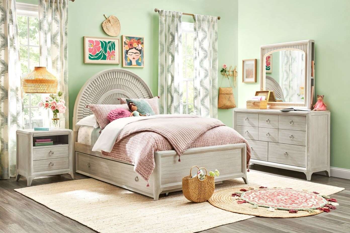 Bedroom furniture set with a bed, dresser, and nightstand.
