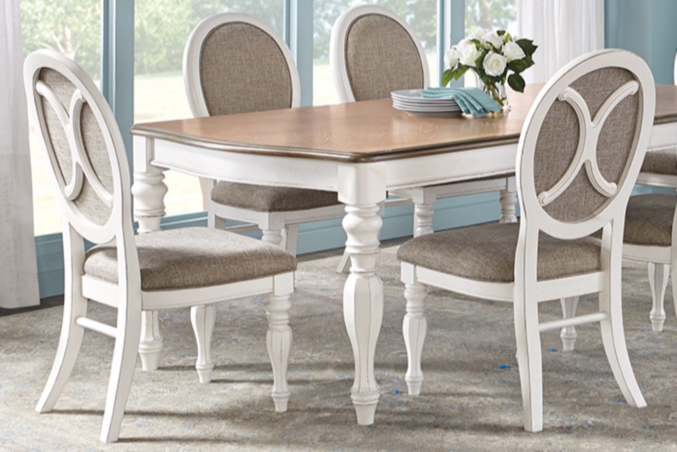 White dining table and chairs.
