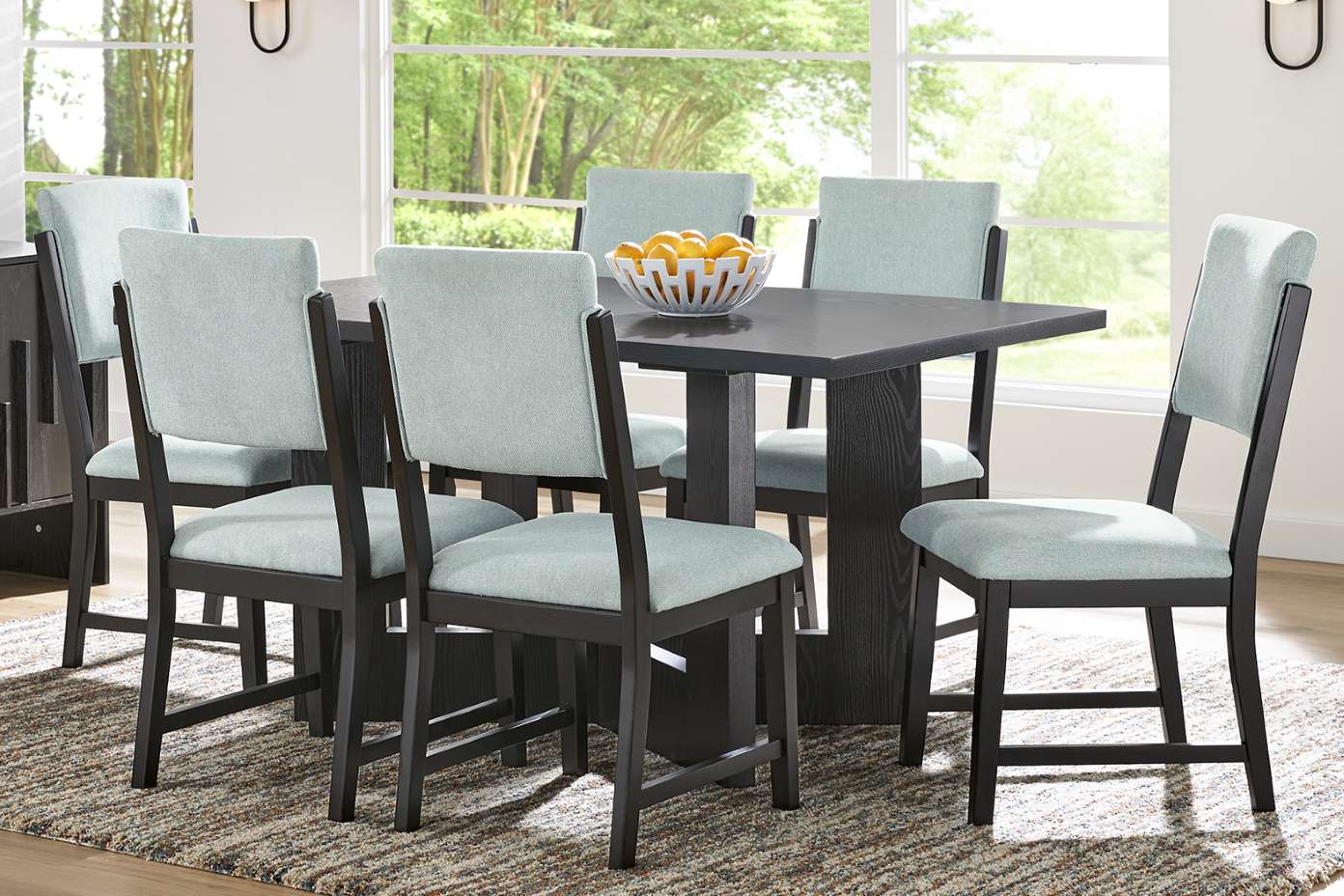 Dining table set with six chairs.