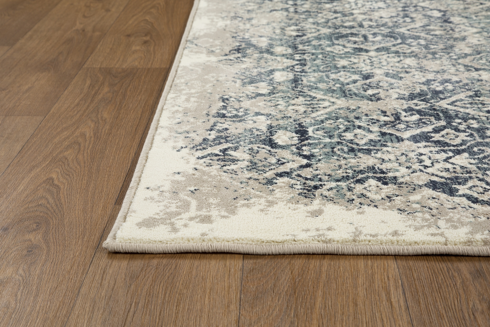 Dunnora Ivory/Blue 7'7 x 10'10 Rug - Thumbnail - Image 4
