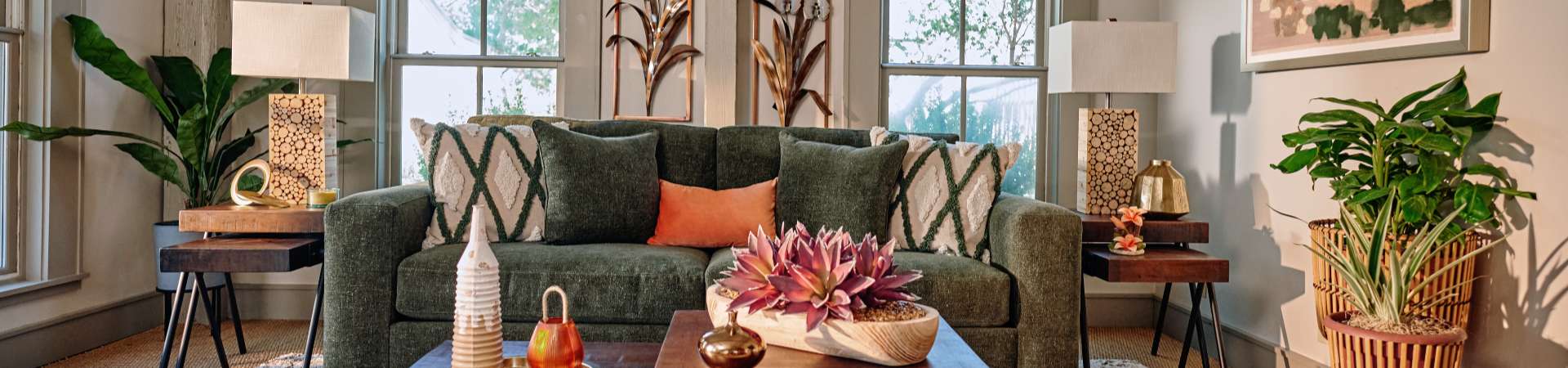 Living room decorated with greenery and earth tones