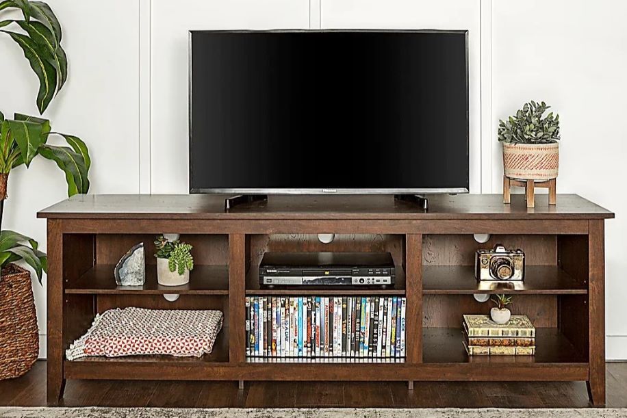 Walnut TV console with open storage compartments