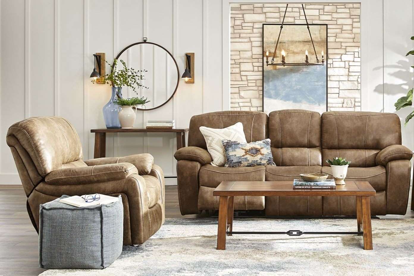 Brown leather sofa and recliner in a living room setting.

