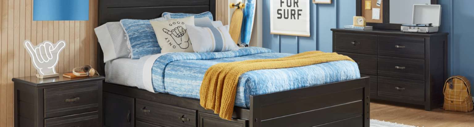 Bedroom set with a bed, nightstand, and dresser.
