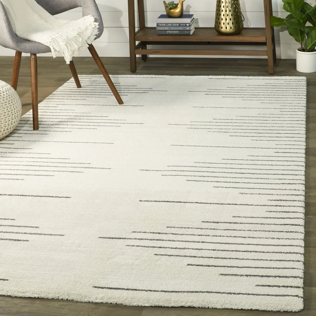 Fellord Cream 7'10 x 10' Area Rug - Thumbnail - Image 2