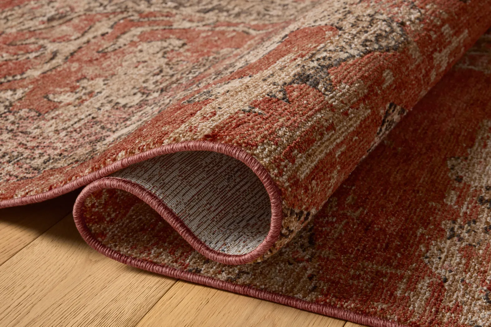 Hartmore Rust Red Polyester Fabric Rug | Rooms to Go
