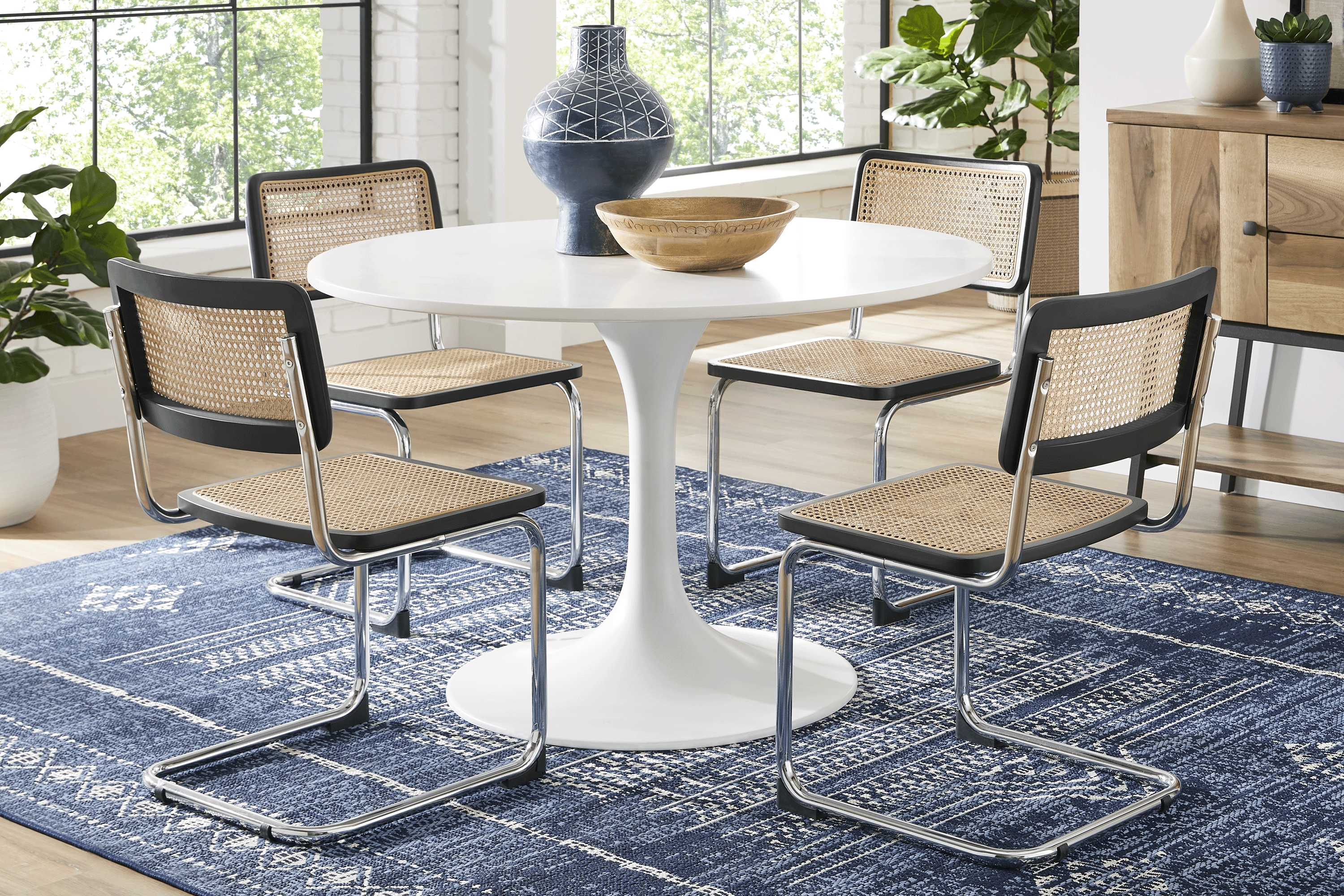 Kaarina White 5 Pc Round Dining Room with Black Cane Chairs - Thumbnail - Image 1