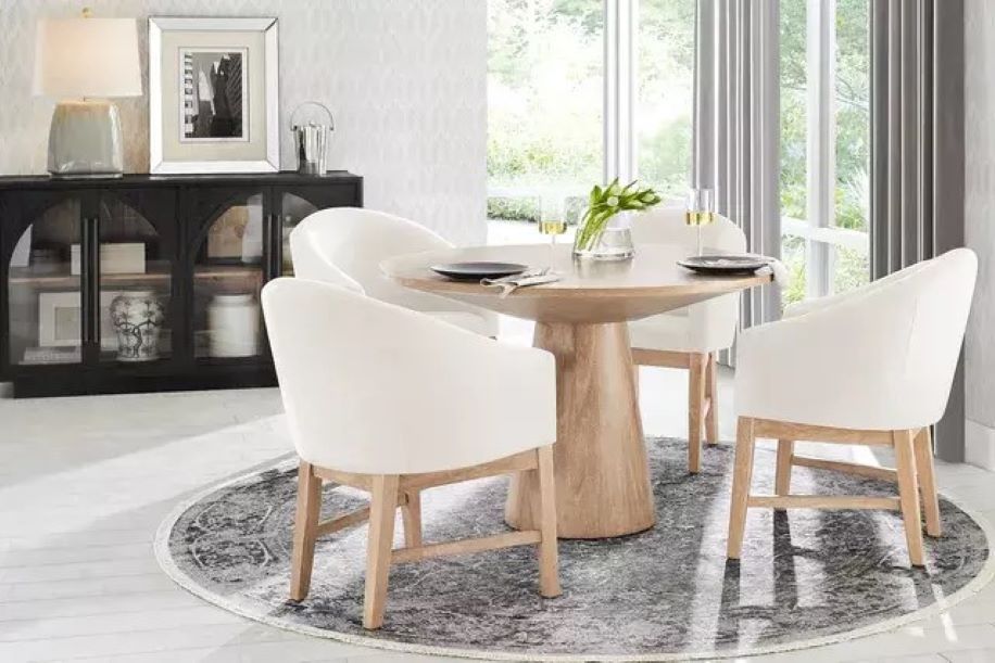 white table with black chairs