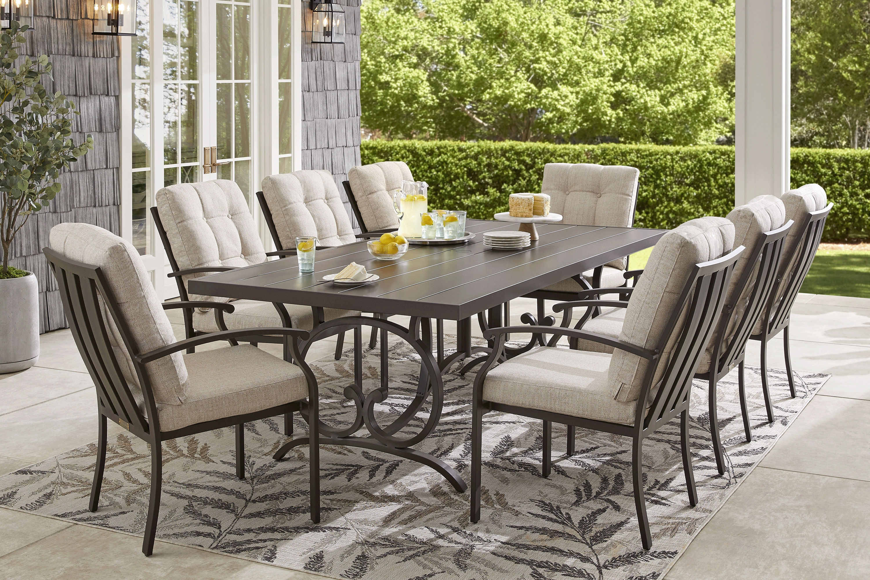 Lake Breeze Aged Bronze 9 Pc Outdoor 90 in. Rectangle Dining Set with Wren Cushions - Thumbnail - Image 1