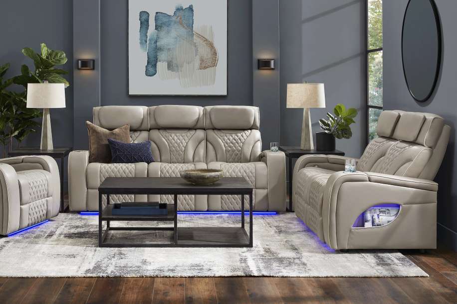 Living room with a gray sofa, recliner, and coffee table.
