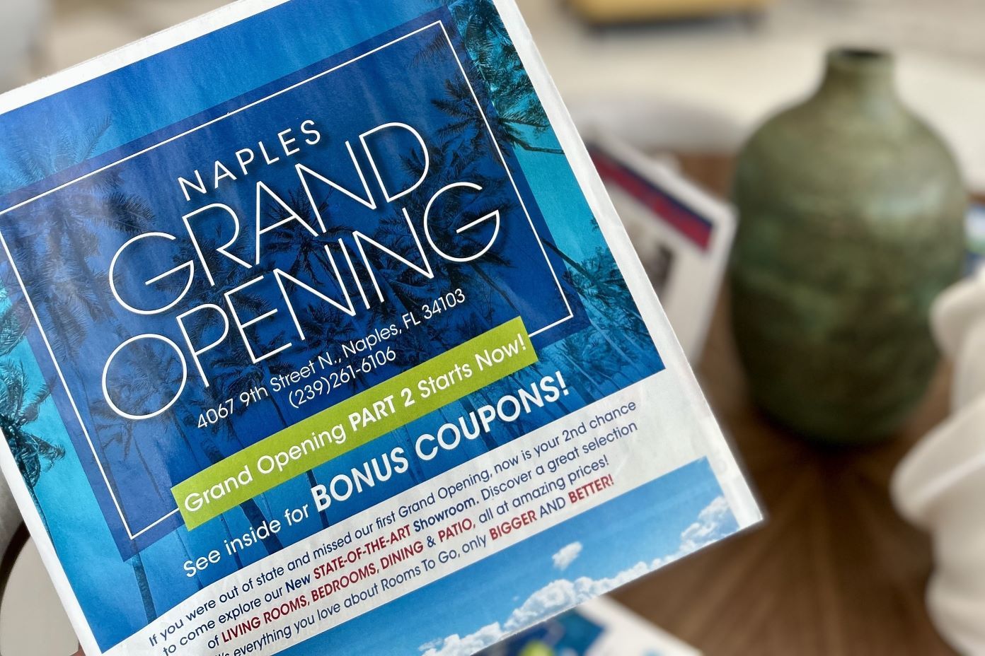 Naples Grand Opening advertisement with bonus coupons.
