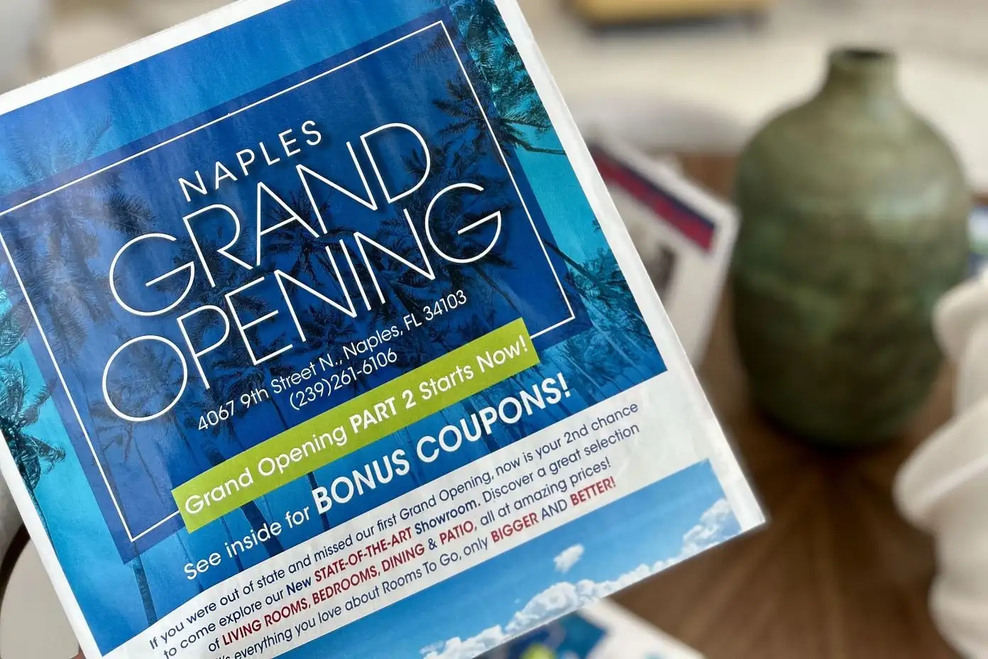 Naples Grand Opening advertisement with bonus coupons.
