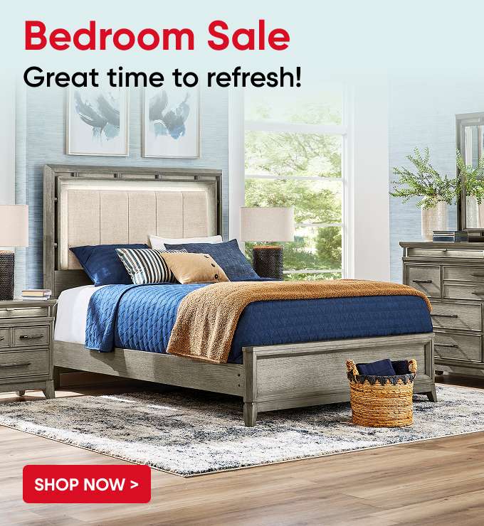 Bedroom Sale. Great time to refresh! A bedroom set with a bed, nightstand, and dresser.

