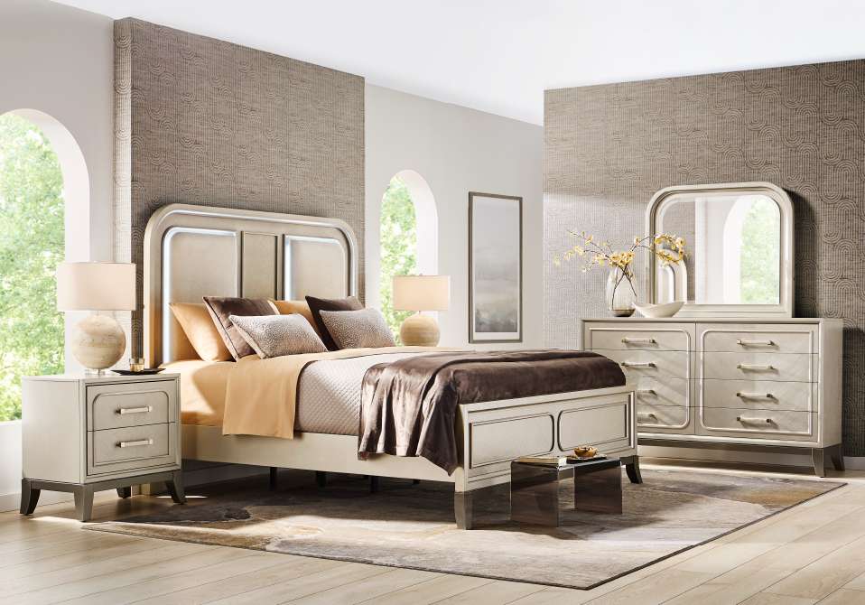 Bedroom furniture set with a bed, nightstand, dresser, and mirror.