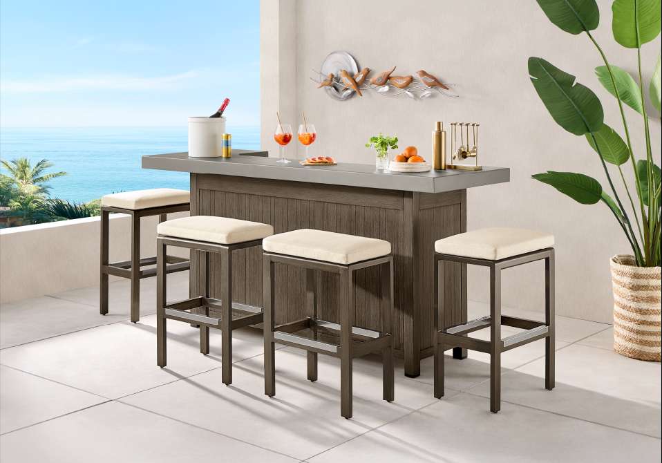 Outdoor bar with stools.
