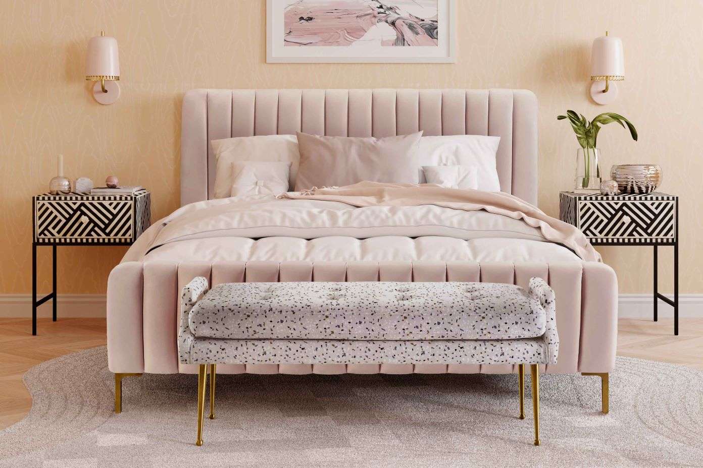 Pink bed with a tufted headboard, matching bench, and geometric nightstands.