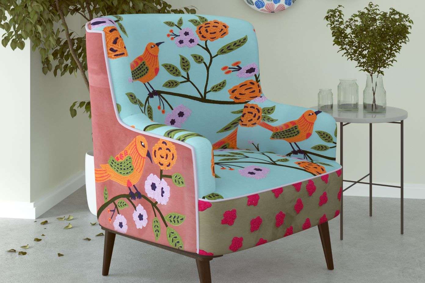 Armchair with a floral and bird pattern.