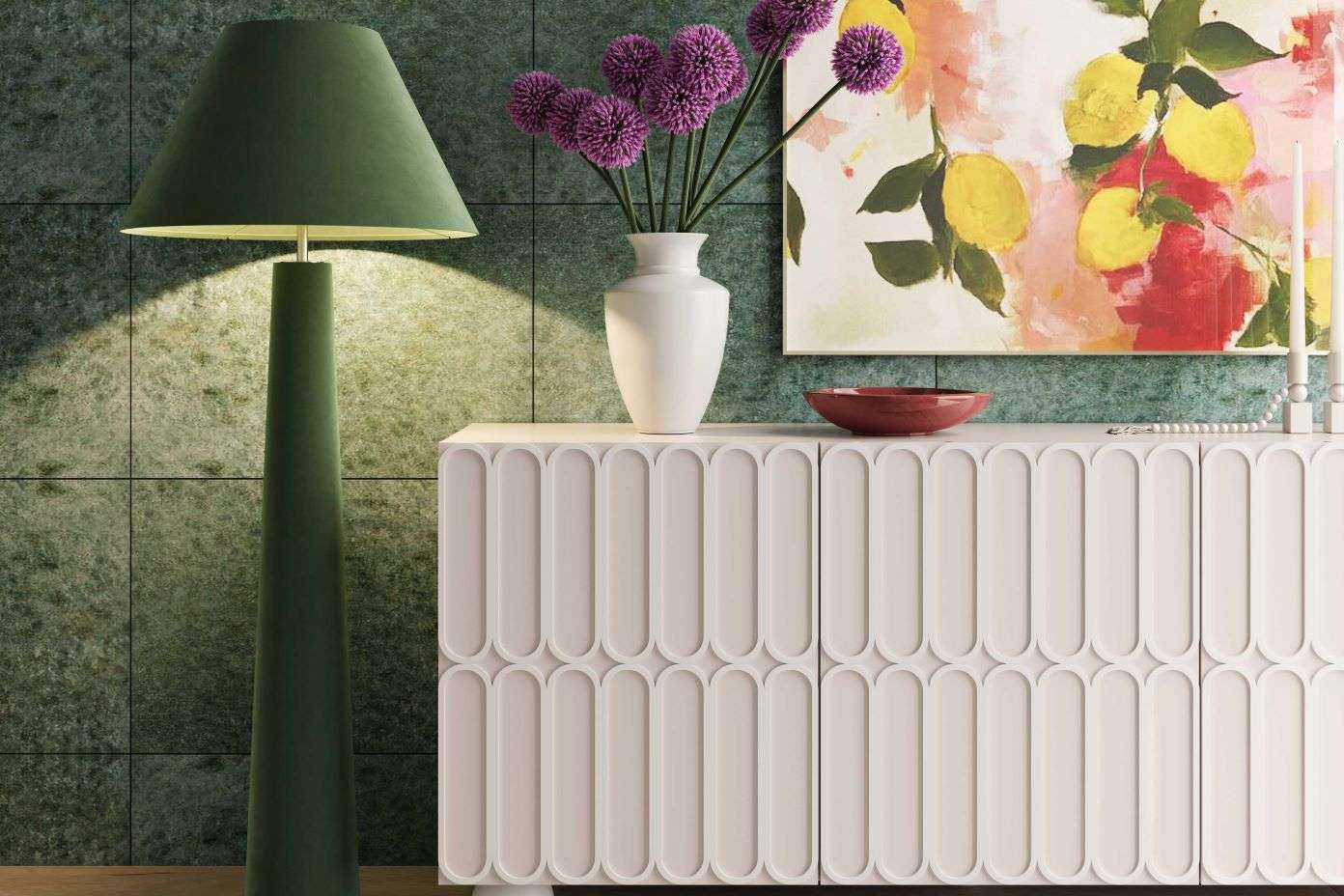Green floor lamp next to a white cabinet with a vase of purple flowers and a painting.
