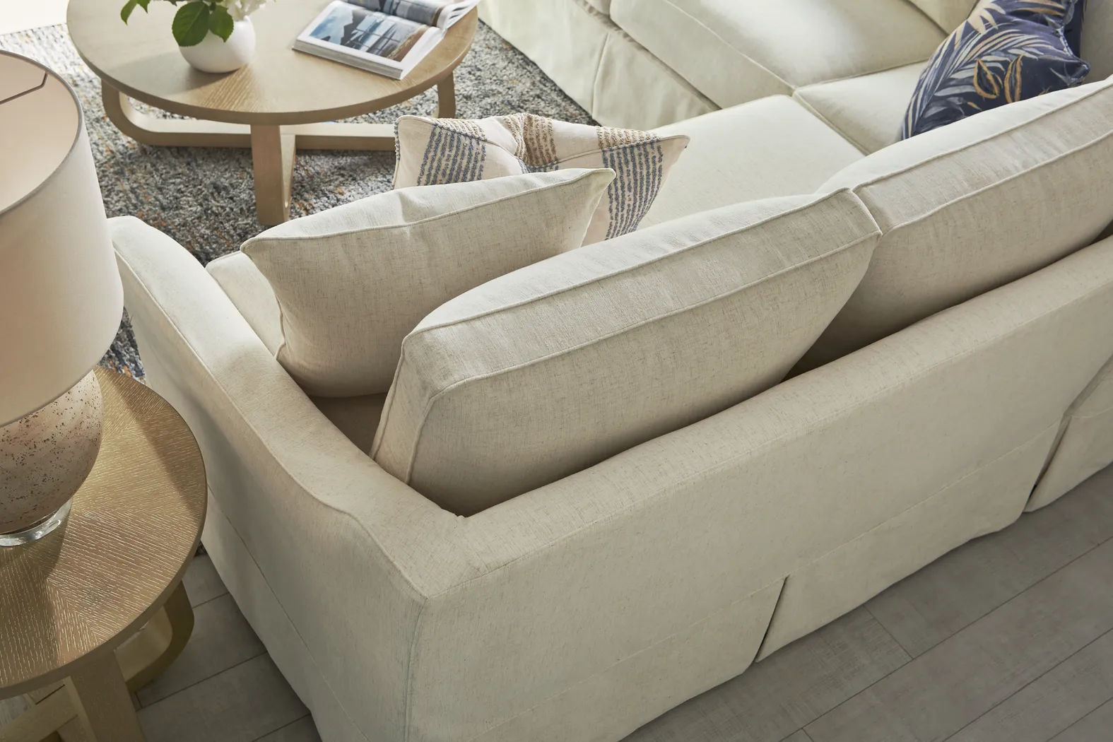 Pacific Grove White Slipcover 2 Pc Sleeper Sectional - Image 7