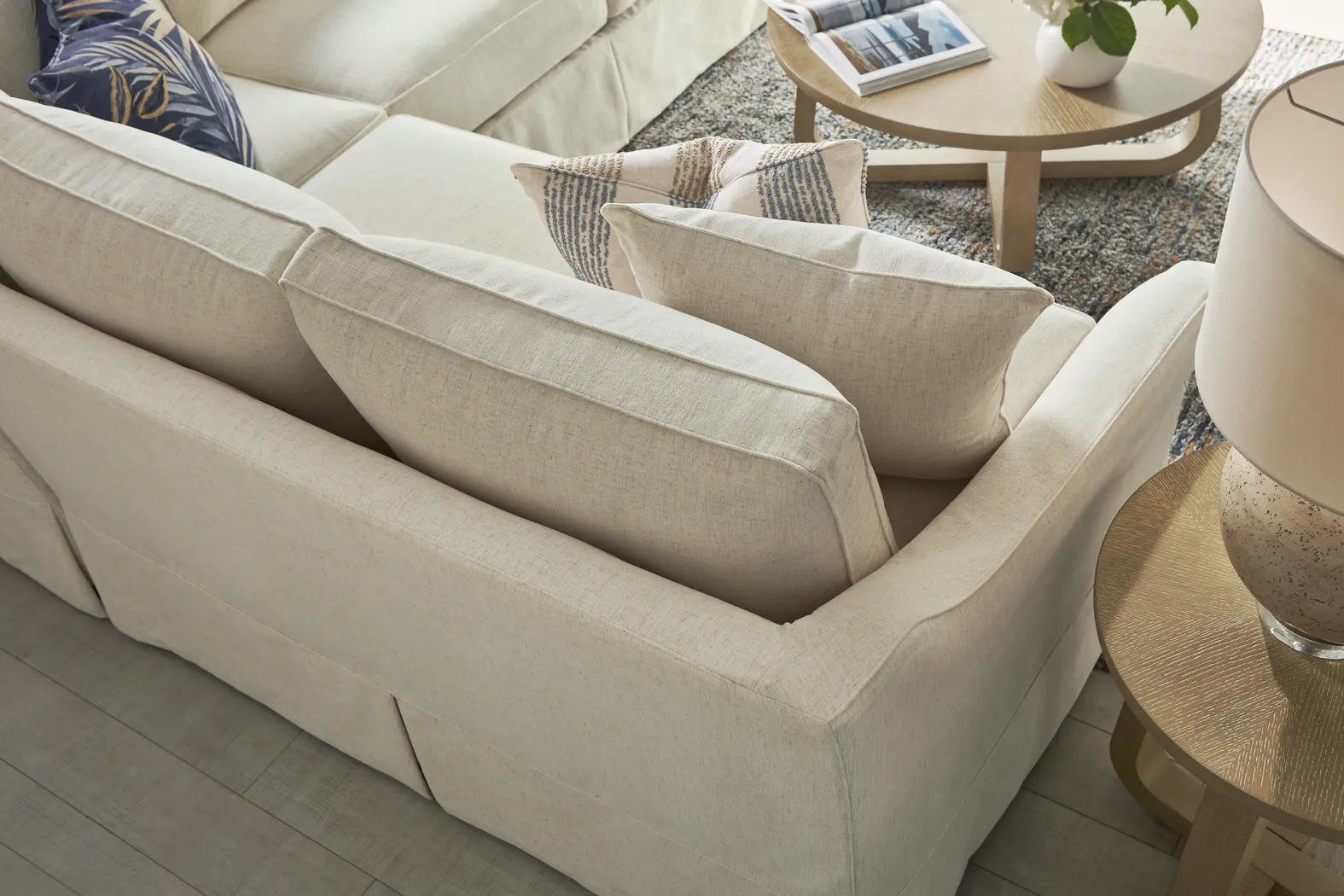 Pacific Grove White Slipcover 2 Pc Sleeper Sectional - Image 7