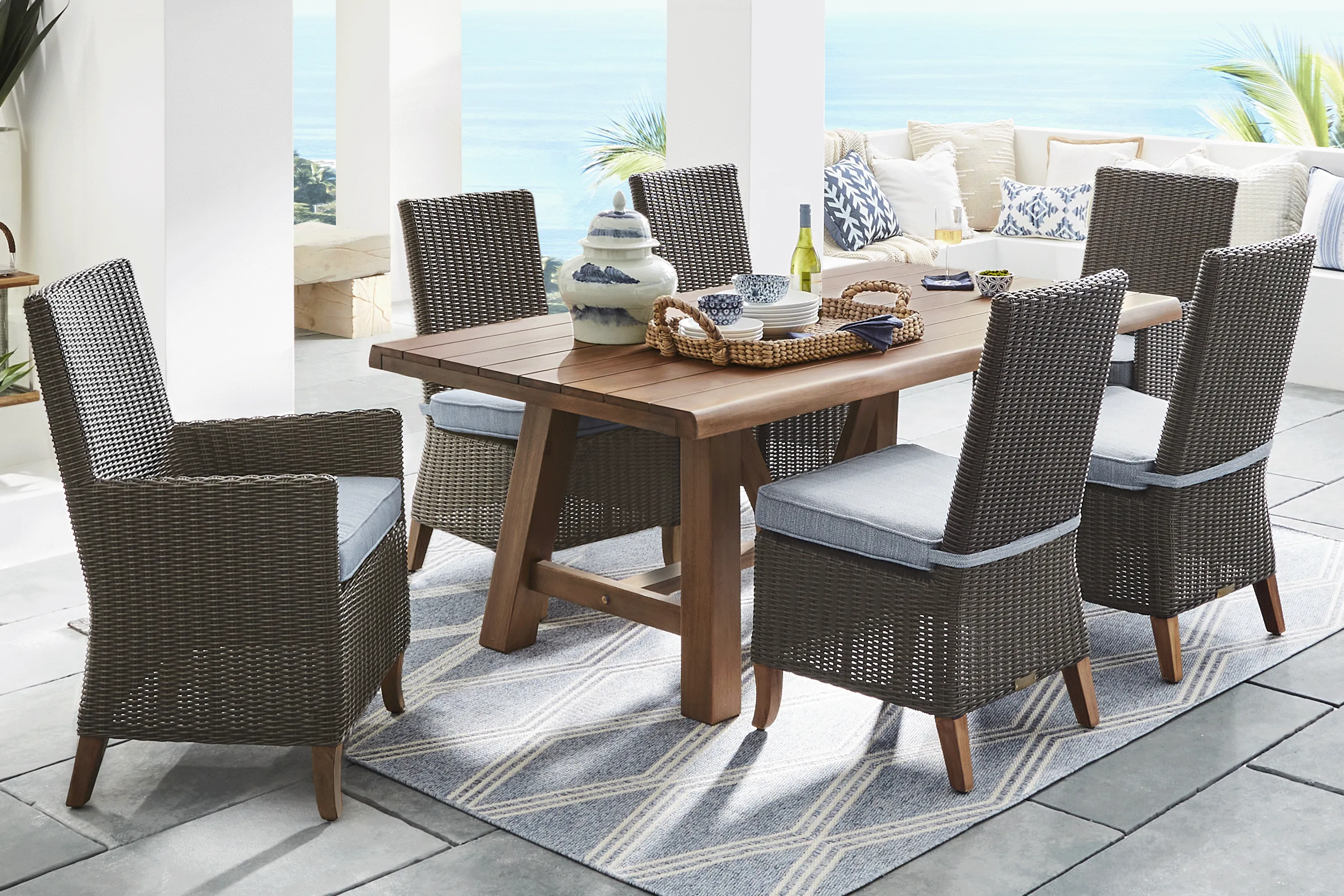 Patmos Tan 7 Pc 102 in. Rectangle Outdoor Dining Set With Steel Cushions - Thumbnail - Image 1