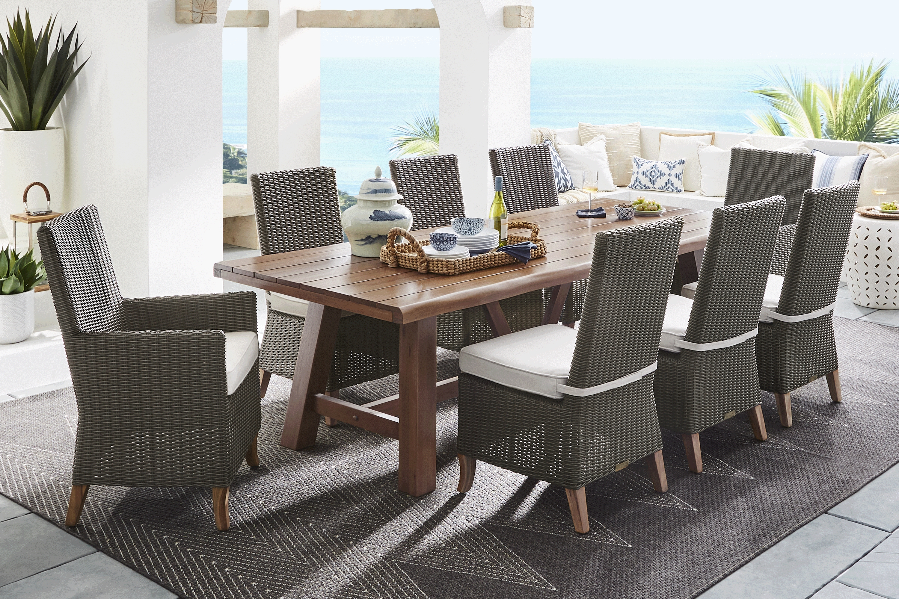 Patmos Tan 9 Pc 102 in. Rectangle Outdoor Dining Set With Linen Cushions - Thumbnail - Image 1