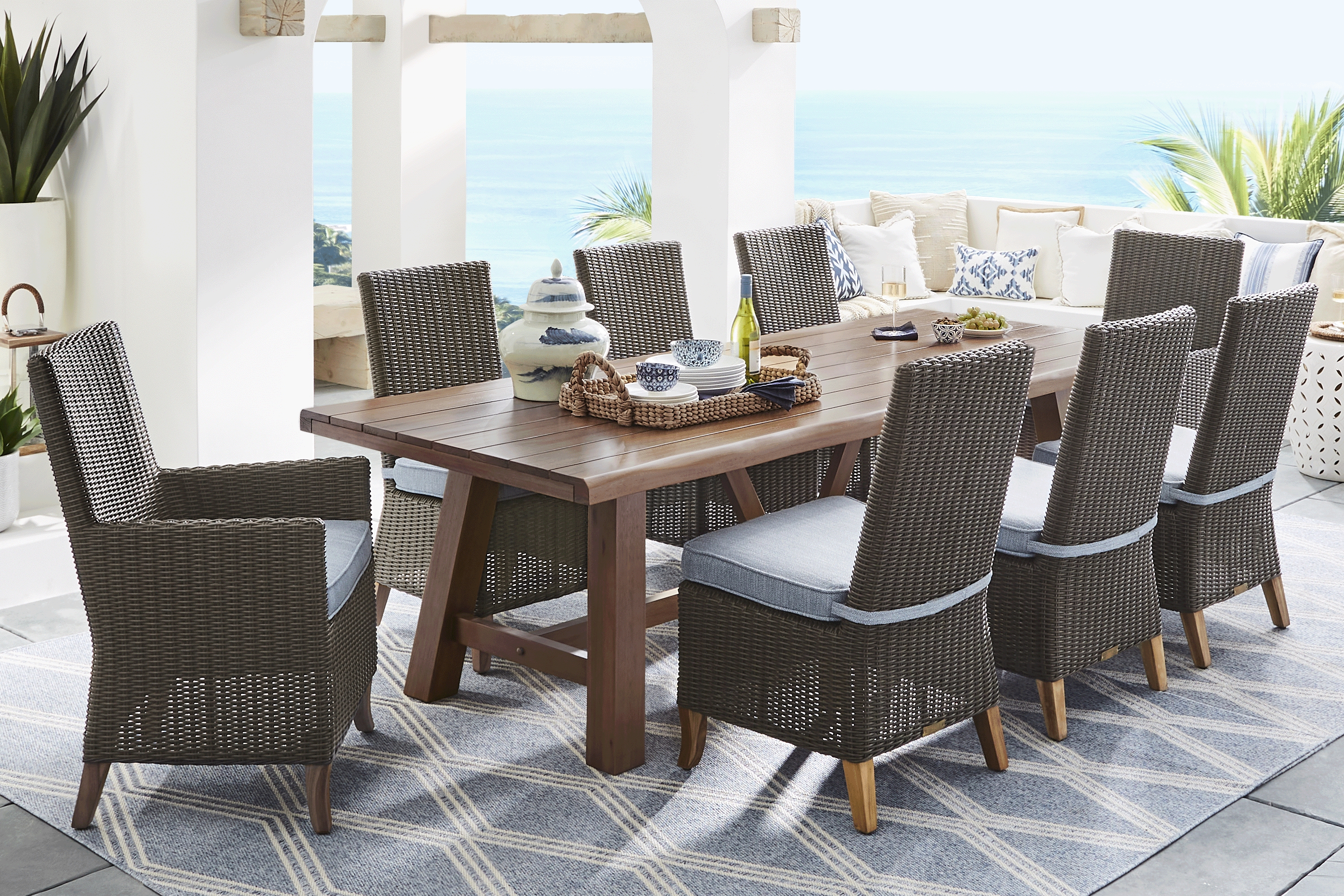 Patmos Tan 9 Pc 102 in. Rectangle Outdoor Dining Set With Steel Cushions - Thumbnail - Image 1