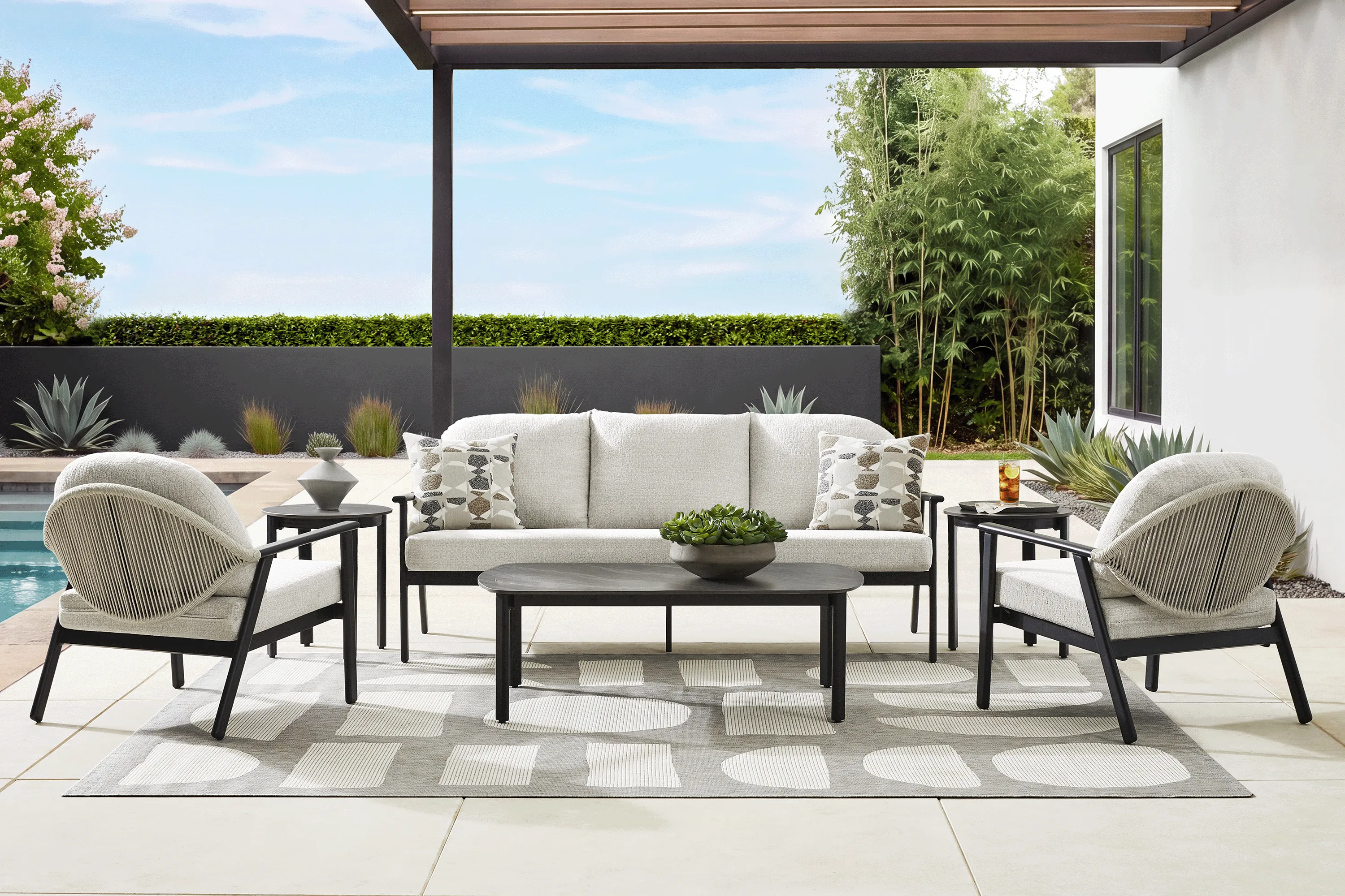 Porto Black 4 Pc Outdoor Seating Set with Beige Cushions - Image 1