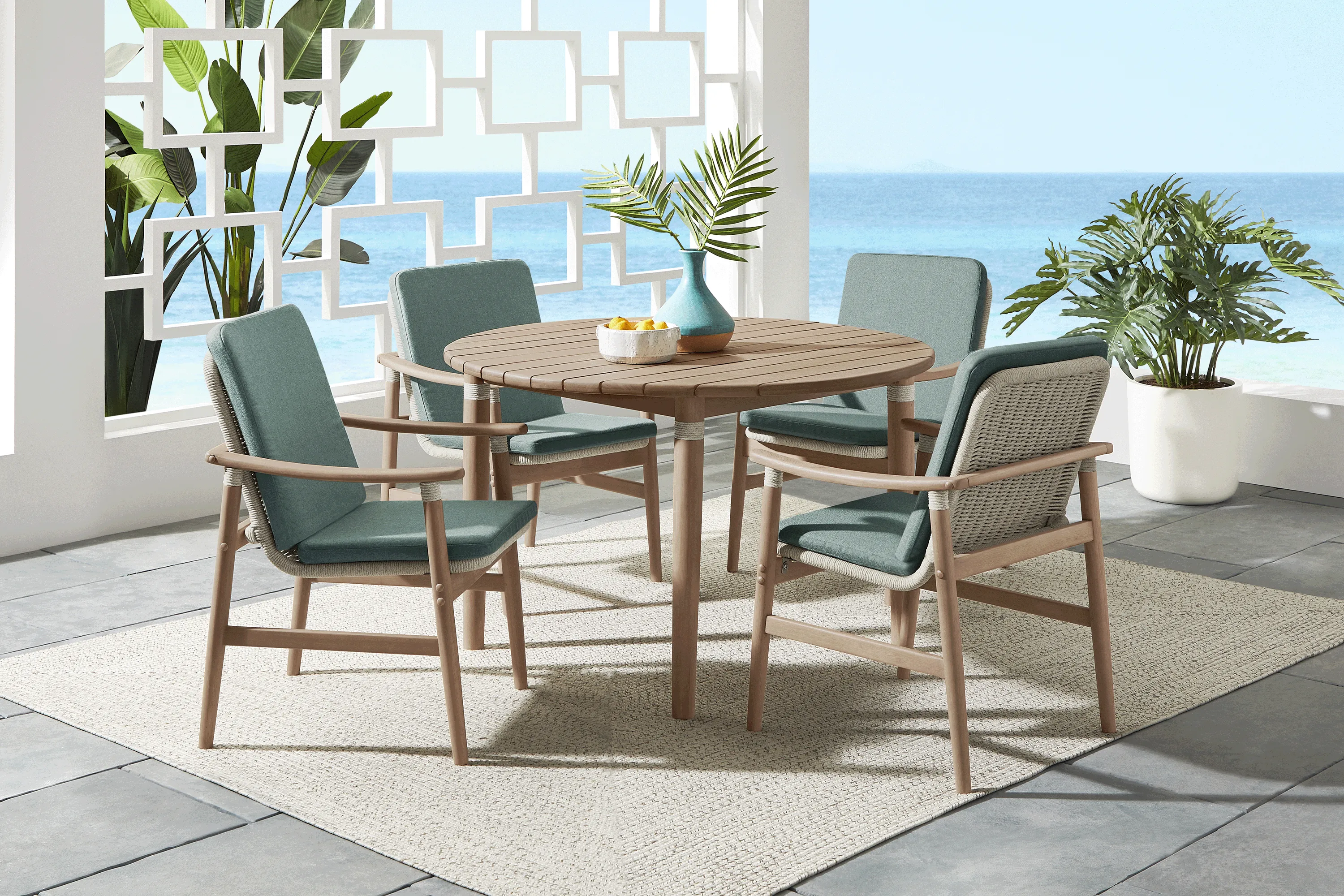 Raphina Gray 5 Pc 47 in. Round Outdoor Dining Set with Jungle Cushions - Thumbnail - Image 1