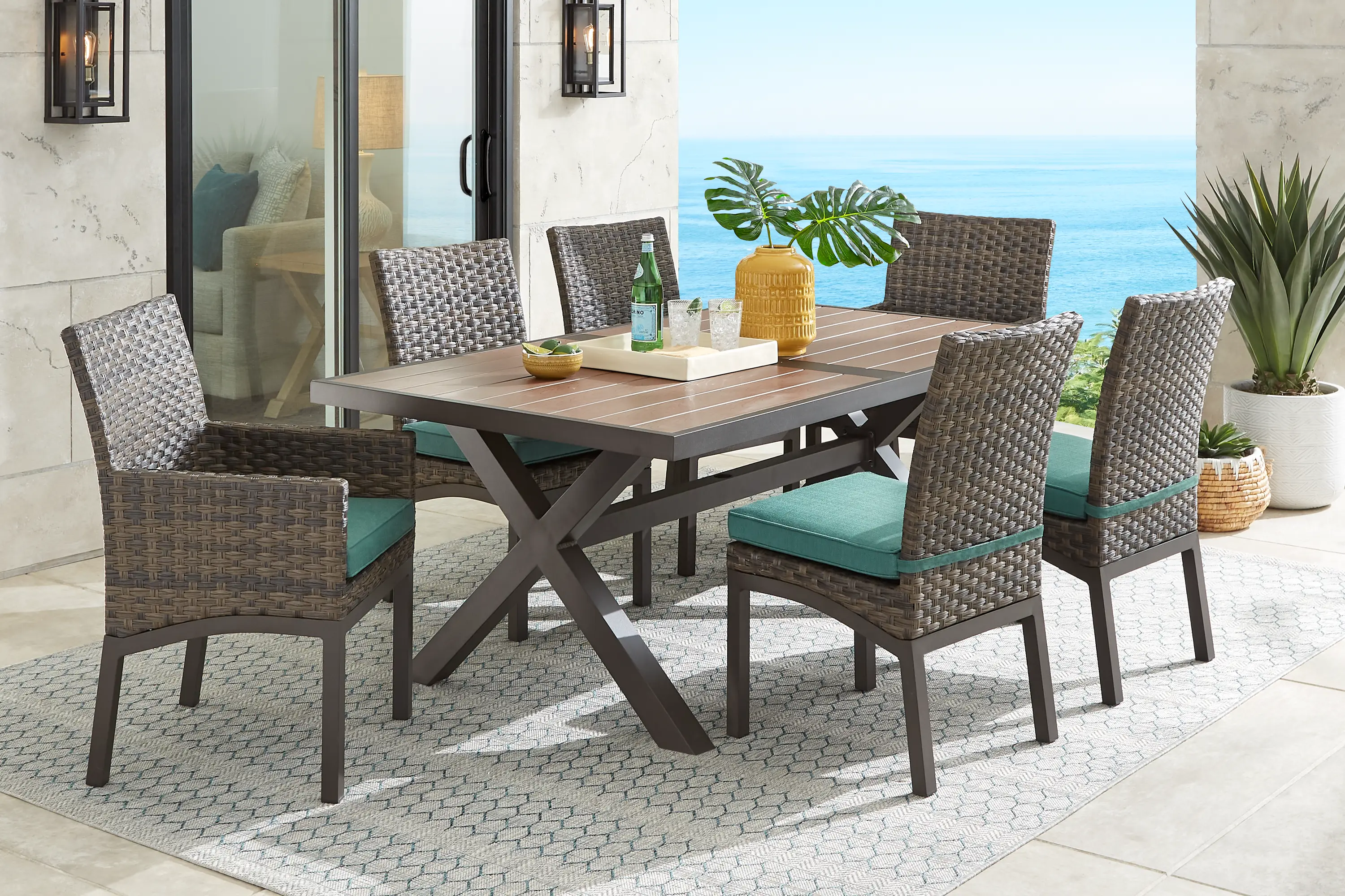 Rialto Brown 7 Pc 71 in. Rectangle Outdoor Dining Set with Aqua Cushions - Thumbnail - Image 1