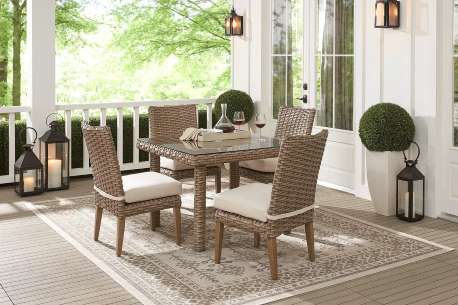 patio dining set by a pool 