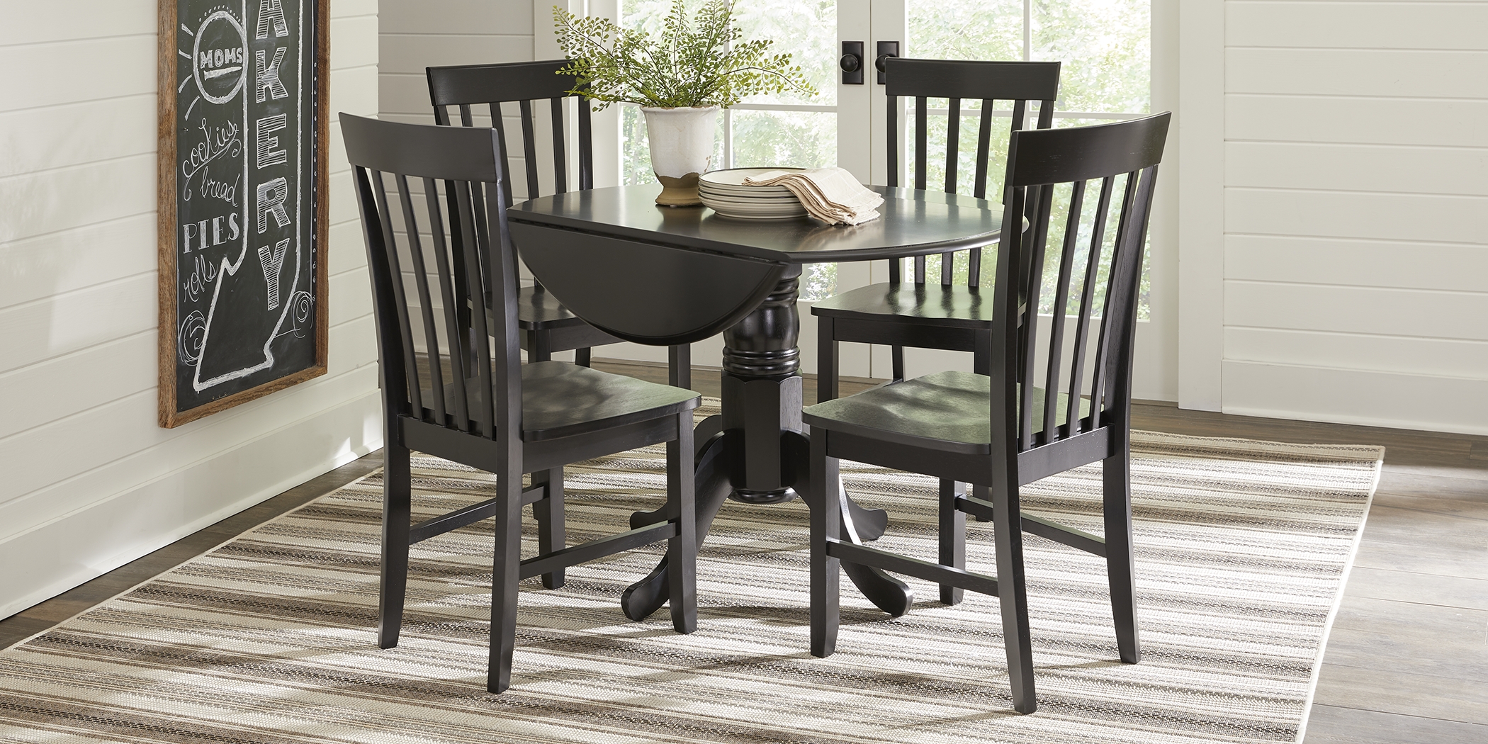 Smithtown Black Round Dining Table - Thumbnail - Image 3