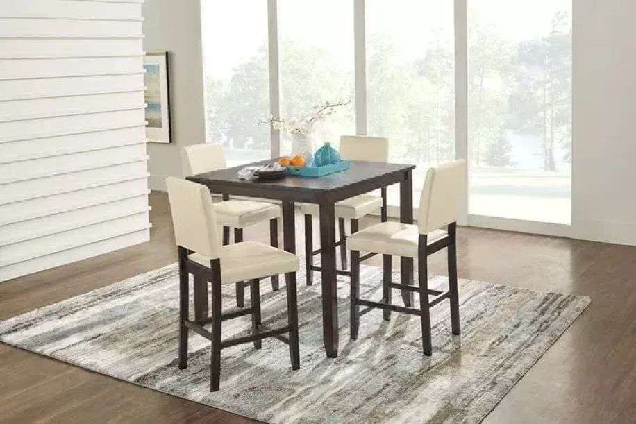 brown chairs with a white table