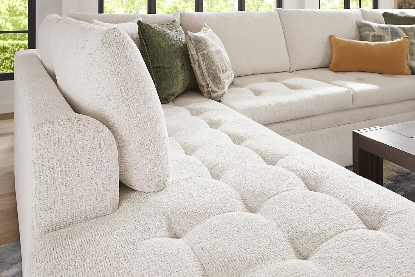 gray couch with light colored pillows