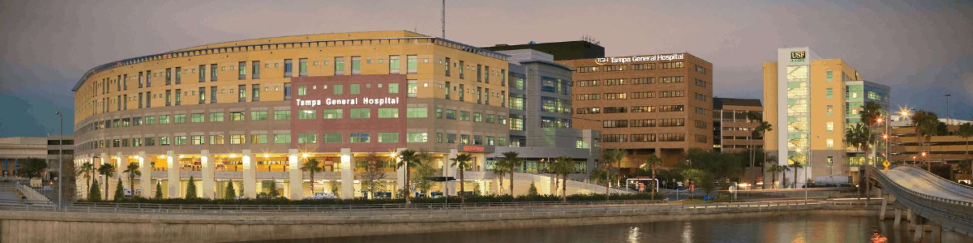 Tampa General Hospital. A large hospital complex at dusk.