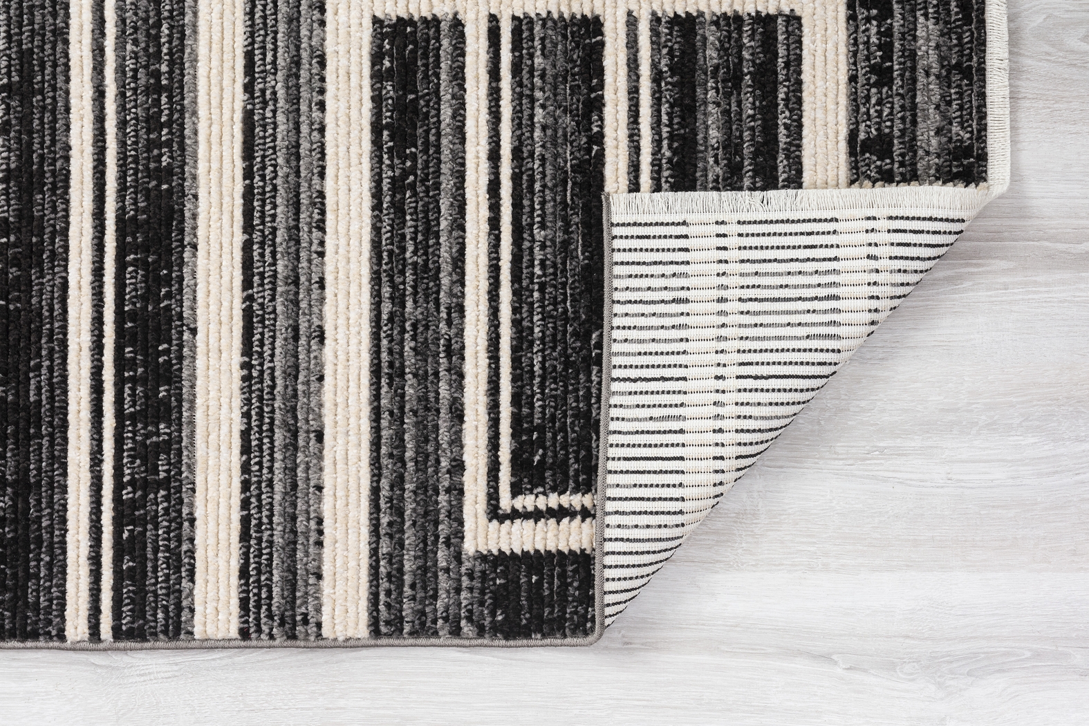 Valraine Black 5'7 x 7'7 Rug - Thumbnail - Image 9