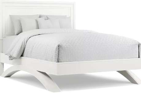 White bed frame with a headboard and bedding.
