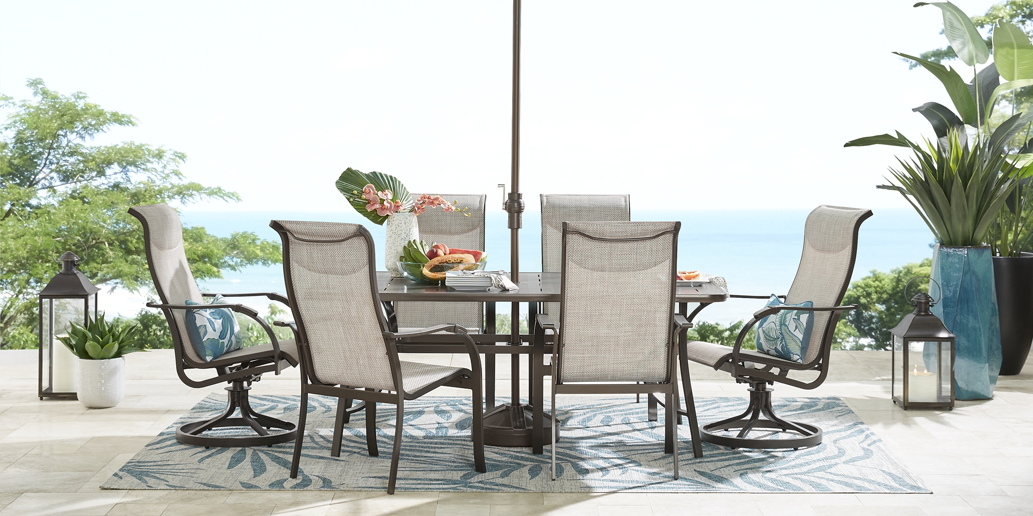 Windy Isle Bronze 7 Pc 72 in. Rectangle Outdoor Dining Set with Swivel Rockers - Thumbnail - Image 2
