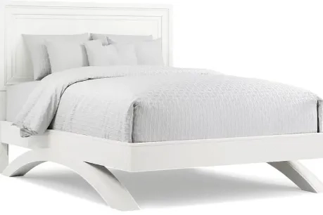 a white bed with arch legs 